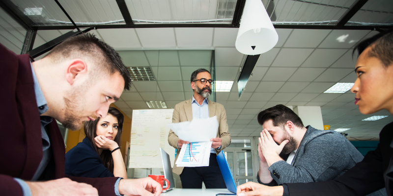 A leader yells at a team—how not to build a culture of trust.