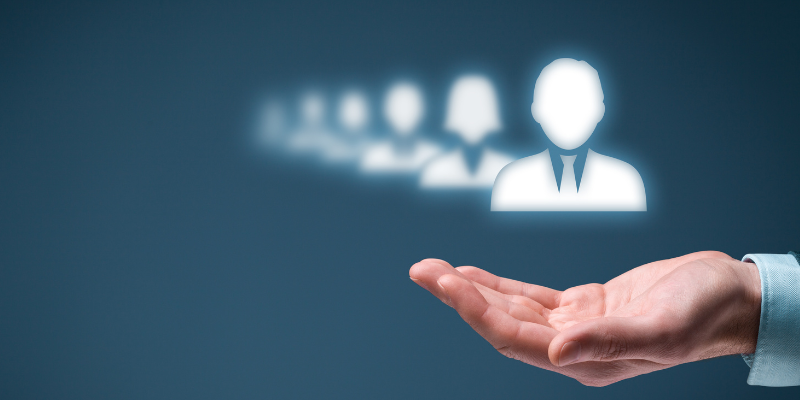 A hand extended over the silhouette of a heads, a metaphor for spans and layers.