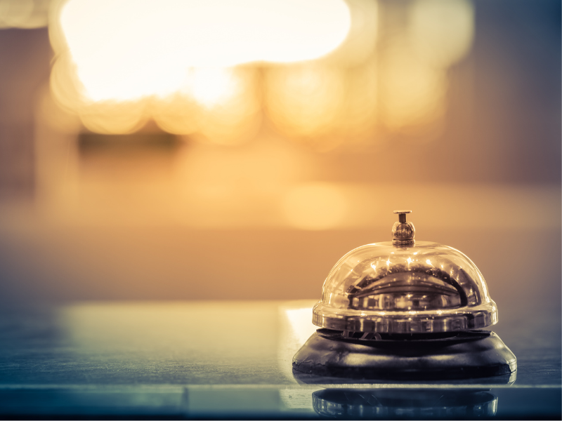 A hotel bell on the check-in desk